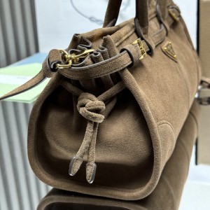 Prada Bonnie suede cinnamon bag  Bags