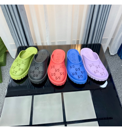 Gucci rubber clogs low heel