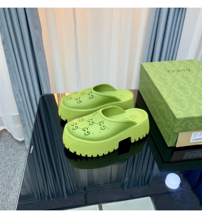 Gucci rubber clogs high heel green